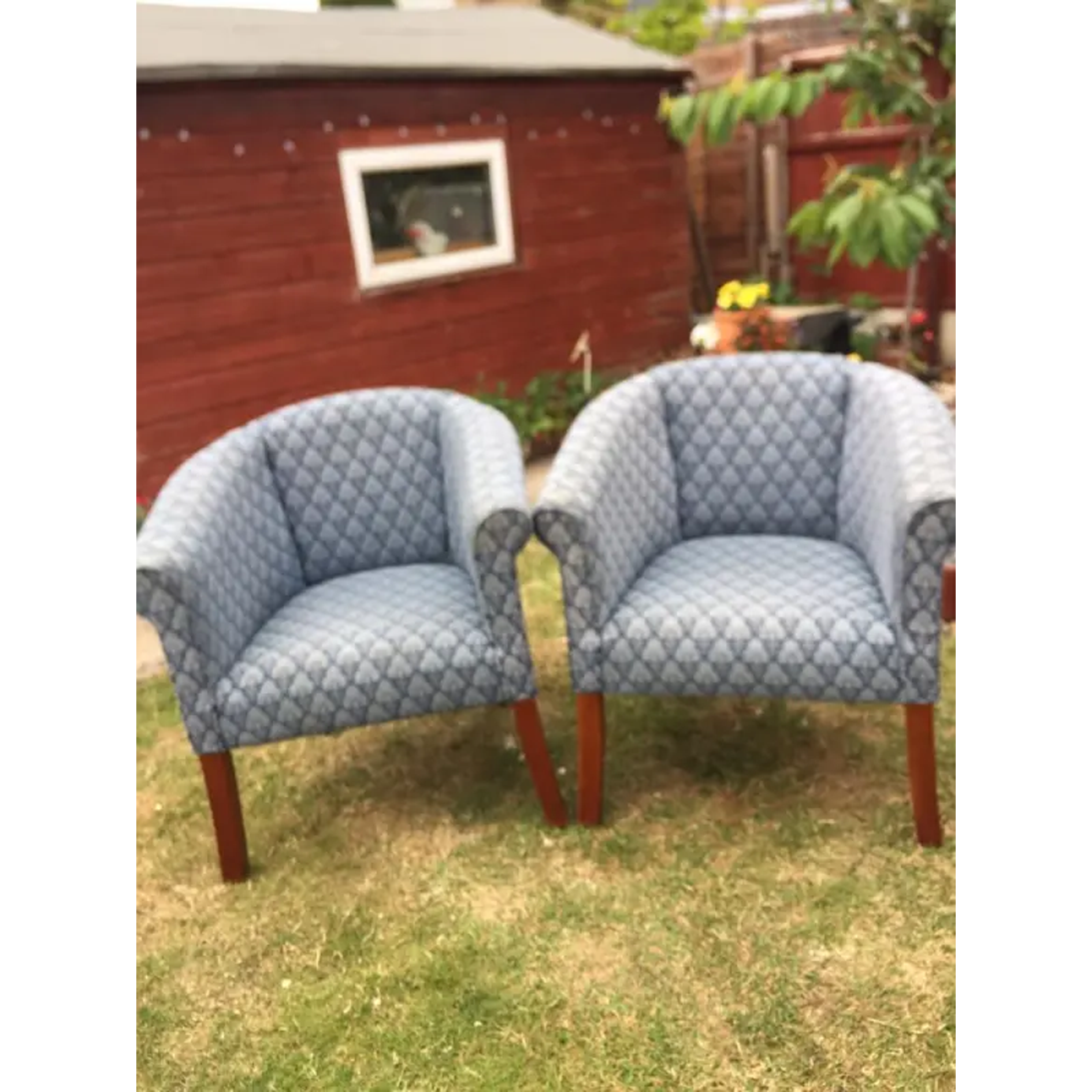 Two matching cup chairs. Delivery available.